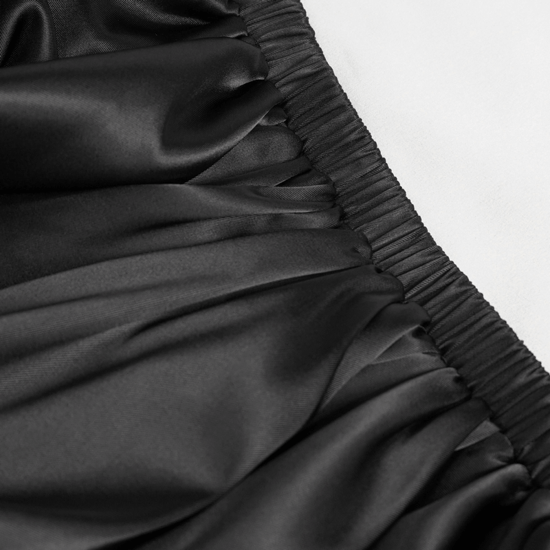 Close-up of soft black satin fabric with gathered detail, perfect for a sexy gothic lingerie dress.