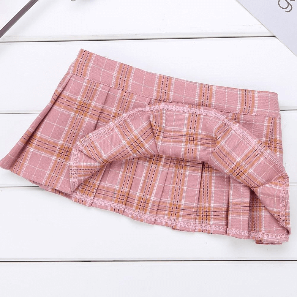 Cute pink plaid mini pleated skirt for ladies in punk style, perfect for a trendy wardrobe.