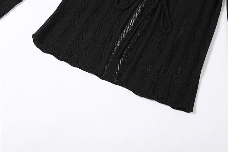 Close-up of the sexy long sleeves women's black knitwear top featuring a lace-up front design with a grunge aesthetic.