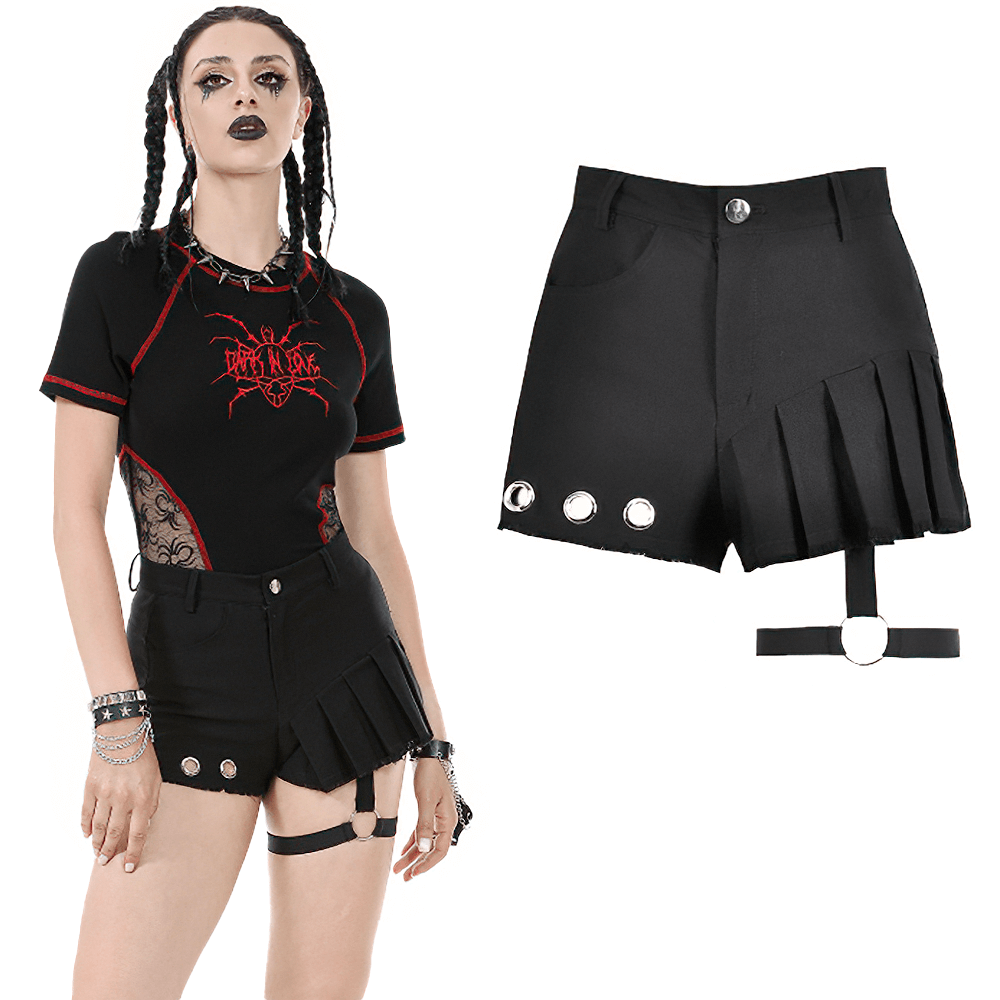 Gothic punk-style pleated shorts with O-ring strap and eyelet details, perfect for alternative streetwear.