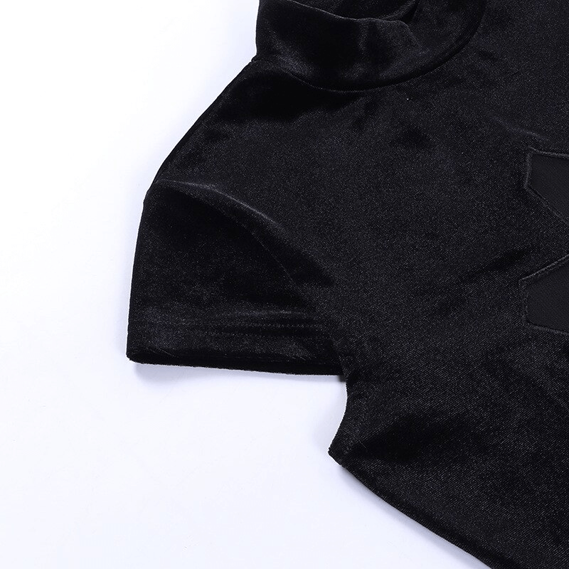 Close-up of sexy punk black T-shirt with sheer cross design, perfect for alternative fashion lovers.