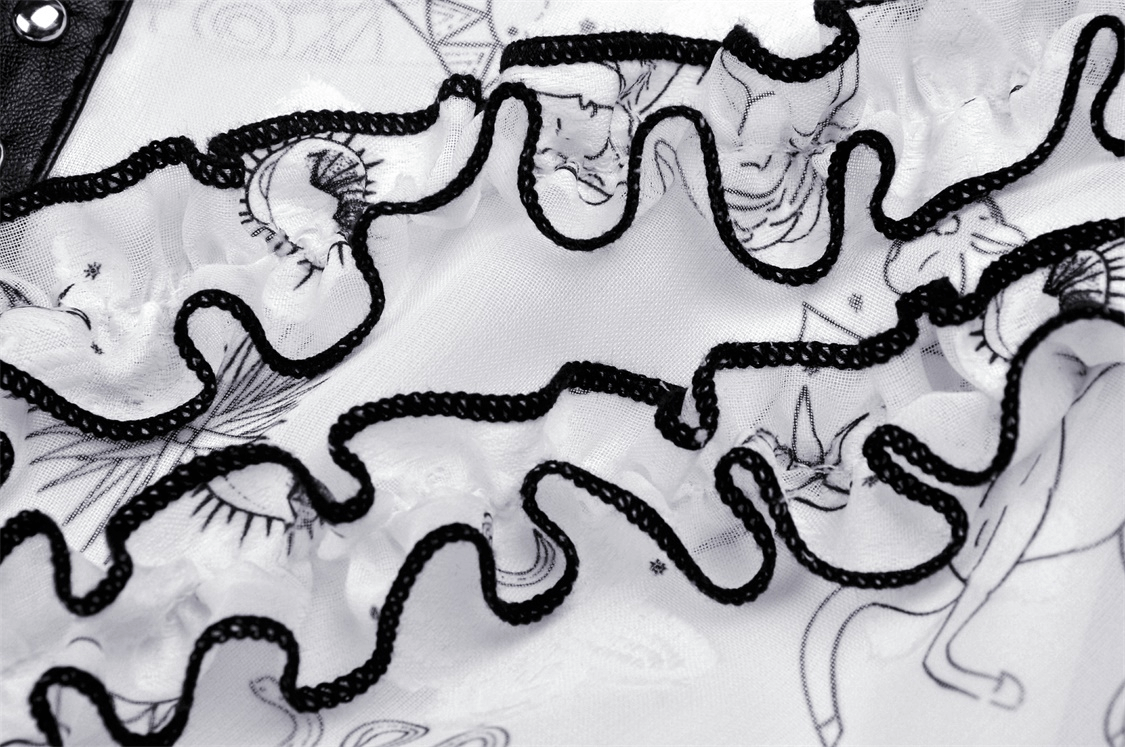 Close-up of the lace trim on a sexy punk strap dress featuring playful animal print details.