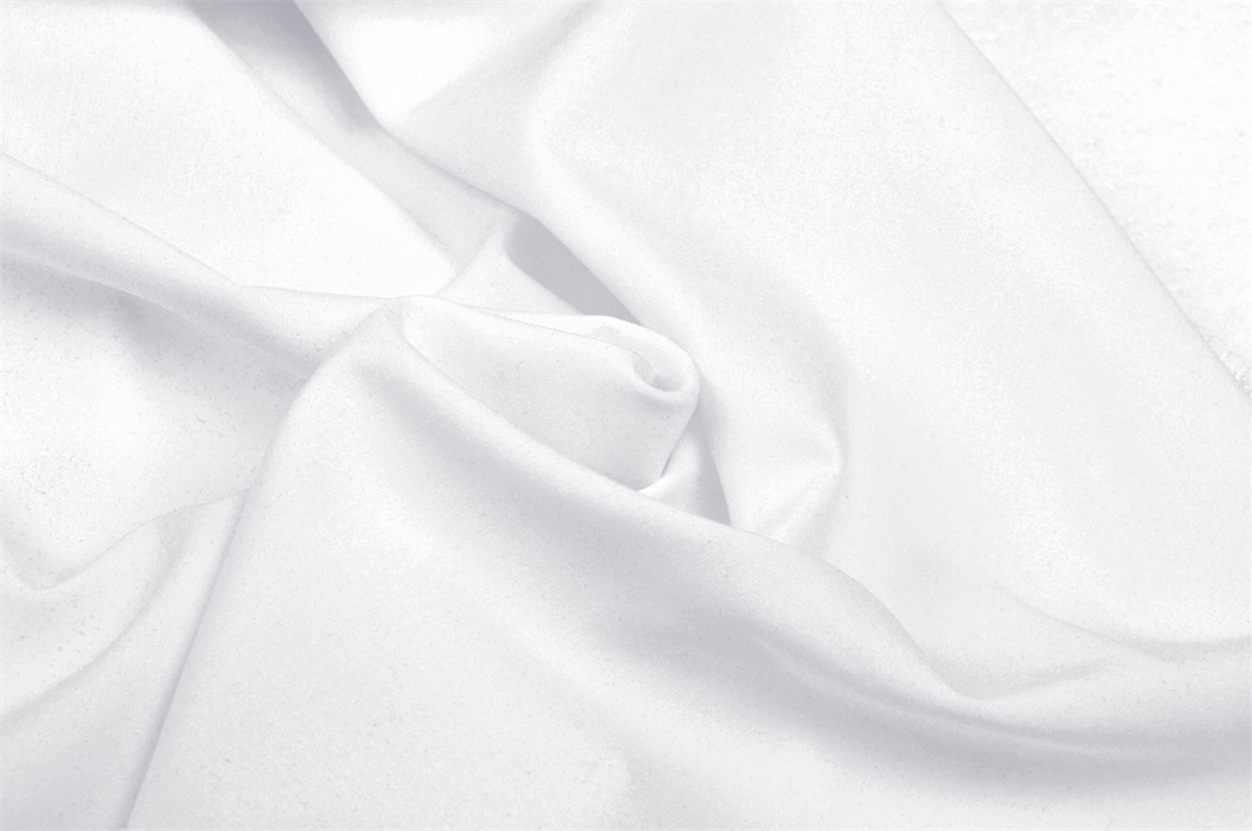 Soft, flowing white fabric perfect for creating stylish punk dresses with lace trim and animal print.