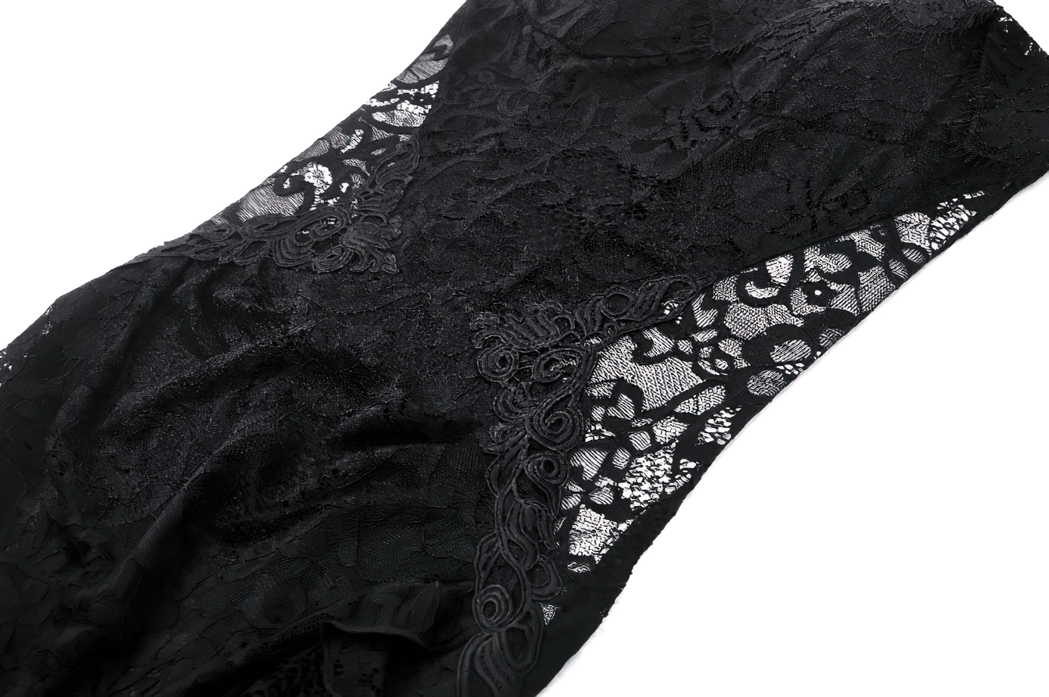 Close-up of a sexy sheer black lace fabric featuring intricate patterns and elegant details for a maxi dress.