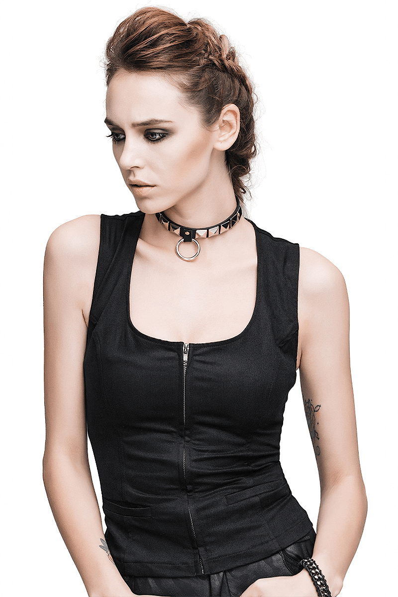 Stylish woman in a black sleeveless zippered tank top, epitomizing gothic steampunk fashion.