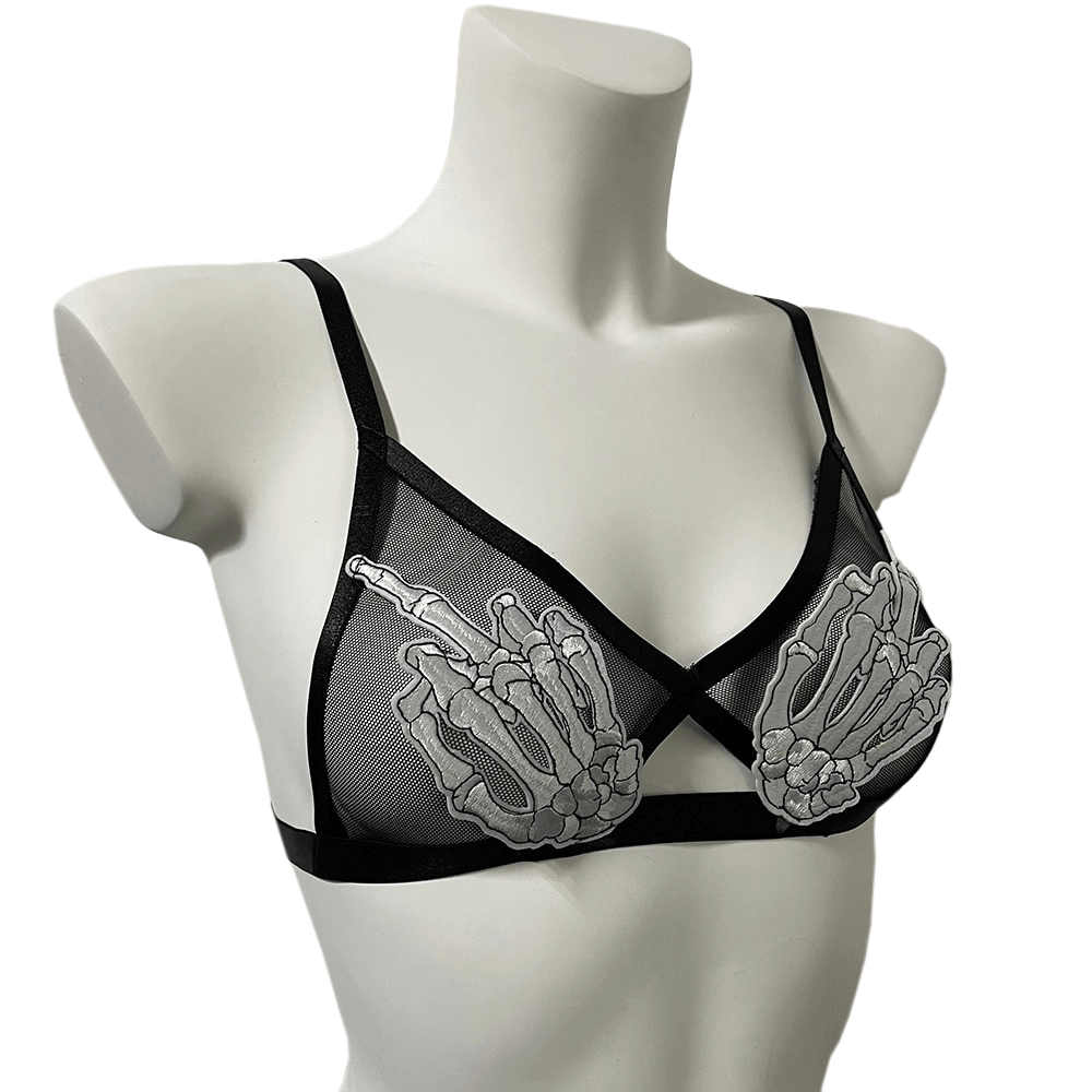 Sexy transparent bra with skeleton patches, gothic style, adjustable straps for a daring look.