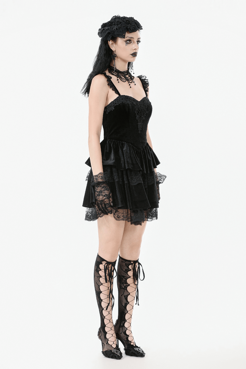 Gothic velvet lace mini dress with ruffles, corset design, and lace-up front for a Victorian-inspired look.