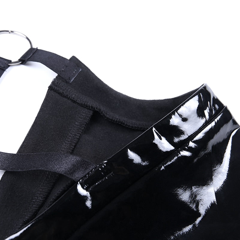 Close-up of the black backless hollow out tank top showcasing sleek PU leather fabric and intricate design details.