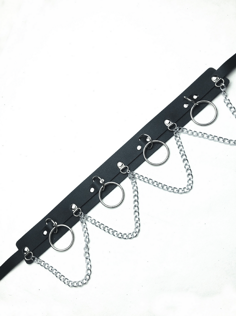 Sexy women's belt with edgy rings and chains, alternative fashion body accessory for bold style statement.