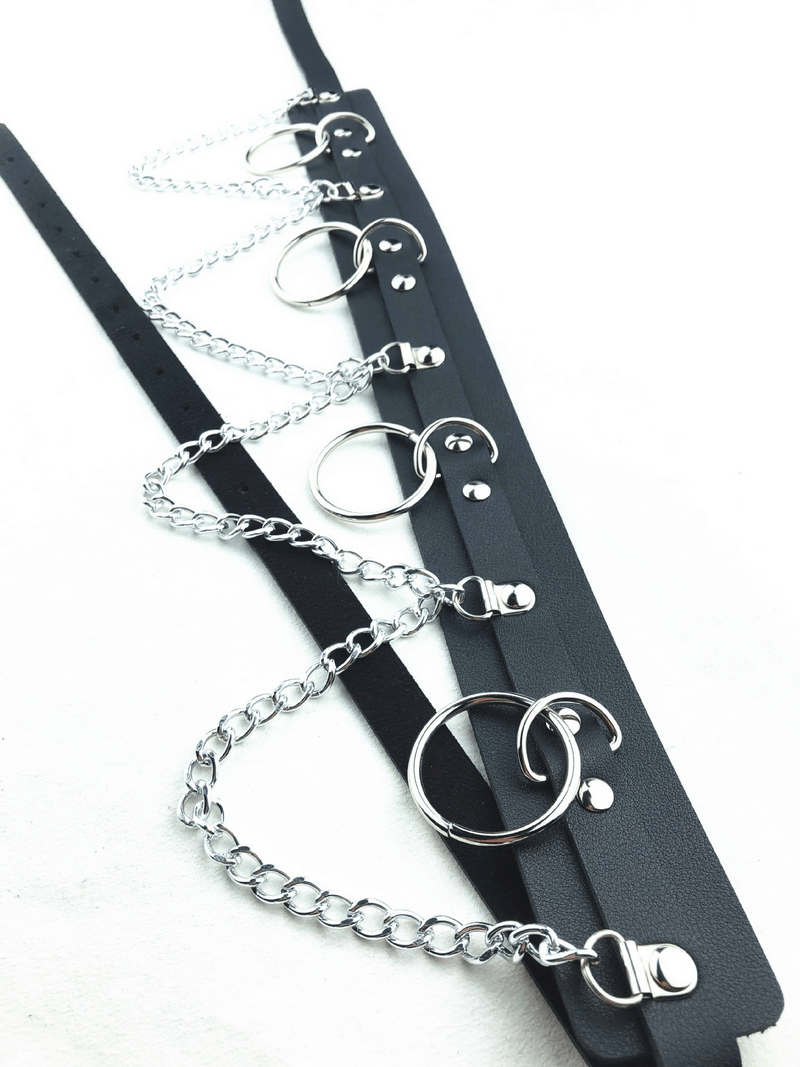 Edgy women's belt with rings and chains, perfect alternative fashion accessory for bold style statements.
