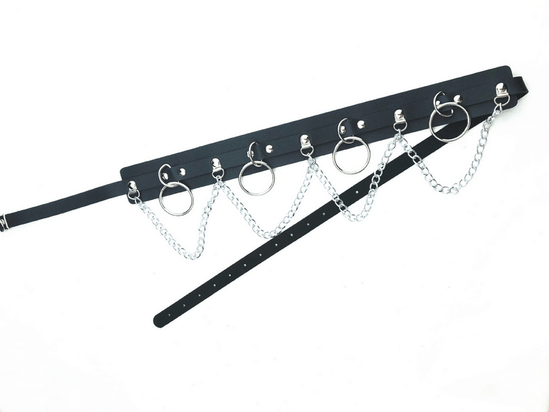 Edgy women's belt with rings and chains - perfect alternative fashion accessory to make a bold statement.