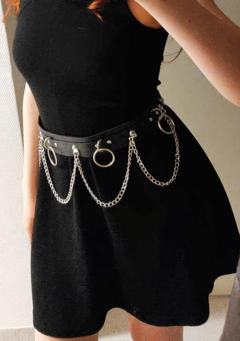 Edgy women's belt with rings and chains, perfect alternative fashion accessory for bold statement outfits.
