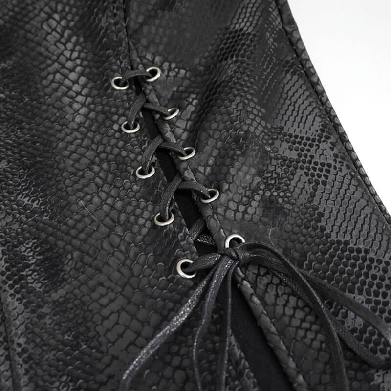 Close-up of lace-up detail on women's black long skirt in synthetic leather, showcasing gothic punk style.