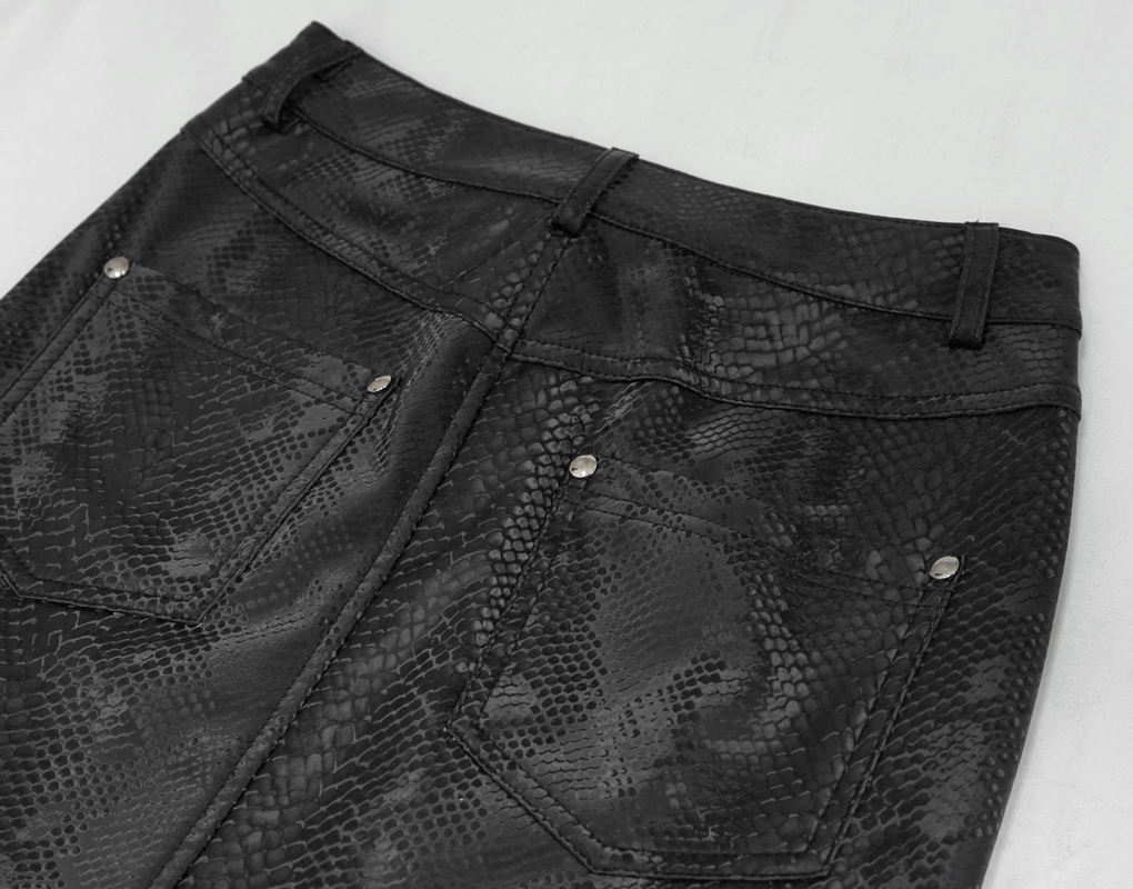 Close-up of a black synthetic leather skirt featuring a snake print design and stylish back pockets.