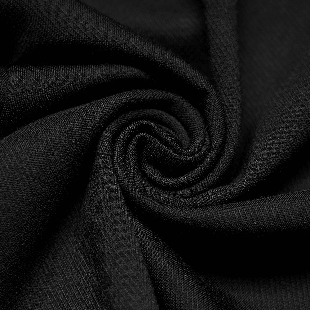 Close-up of luxurious black fabric, showcasing a soft, textured swirl for a stylish gothic bodycon dress.