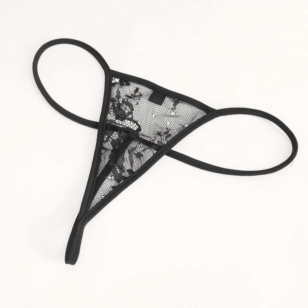 Seductive black lace thong lingerie with intricate design and delicate straps, perfect for a daring silhouette.