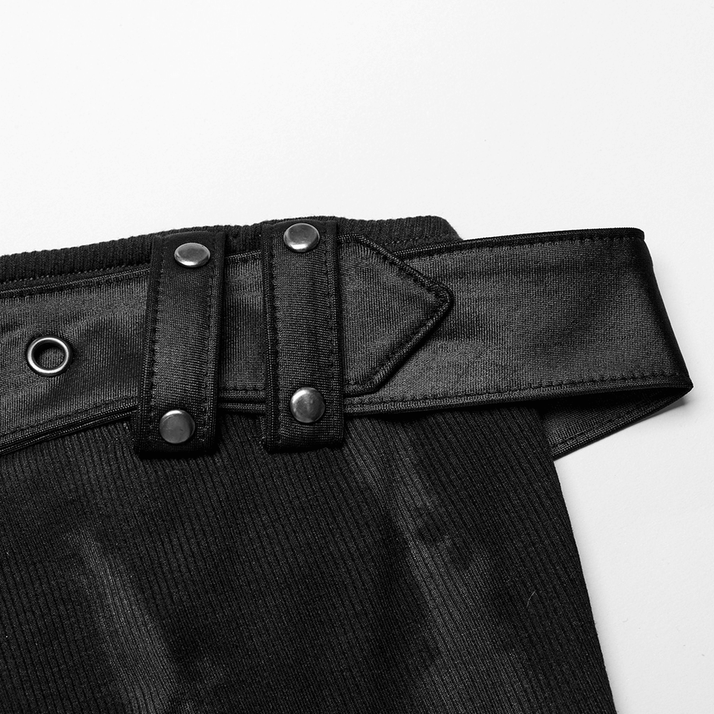 Close-up of an adjustable buckle closure on a black rib knit strapless tube top, showcasing edgy design details.