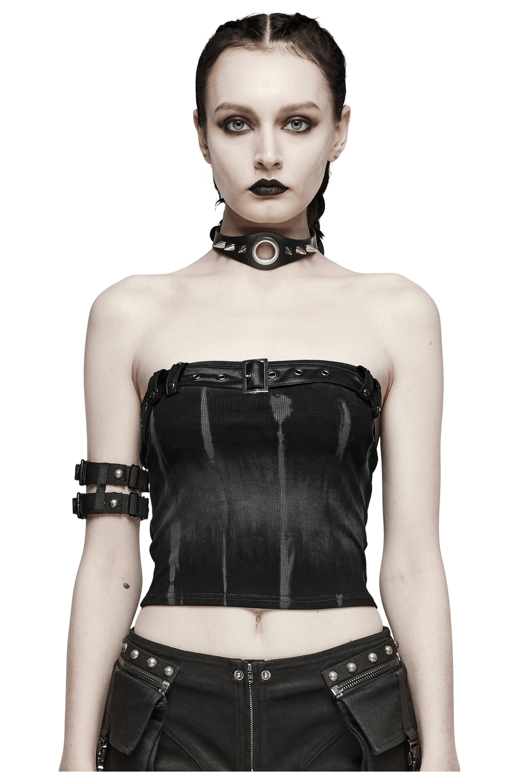 Model in a sexy strapless tube top with buckle detailing, showcasing a bold edgy look and flattering silhouette.