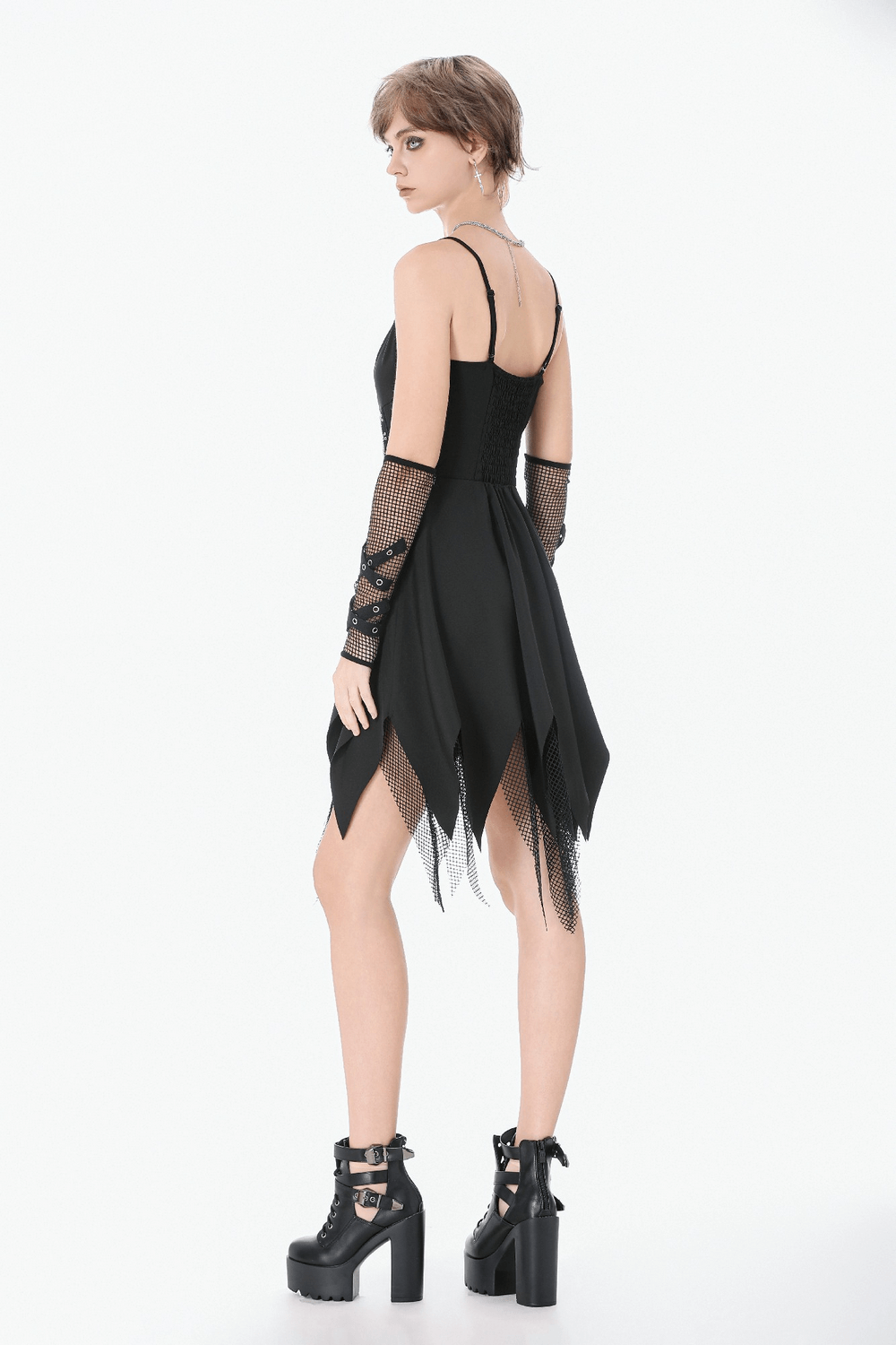 Sexy Zip Front Dress with Fishnet Jagged Hem Detail worn from the back, showcasing its unique layered hem and striking design.