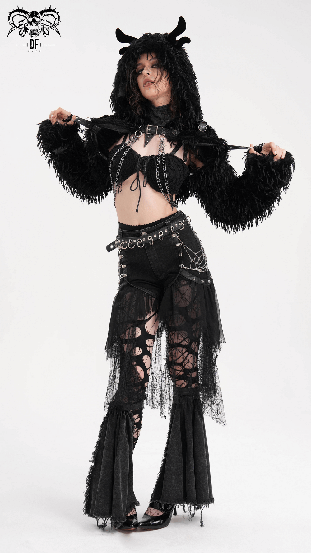 Model showcasing a Shaggy Black Faux Fur Cape with horns and chains, perfect for gothic streetwear and festivals.