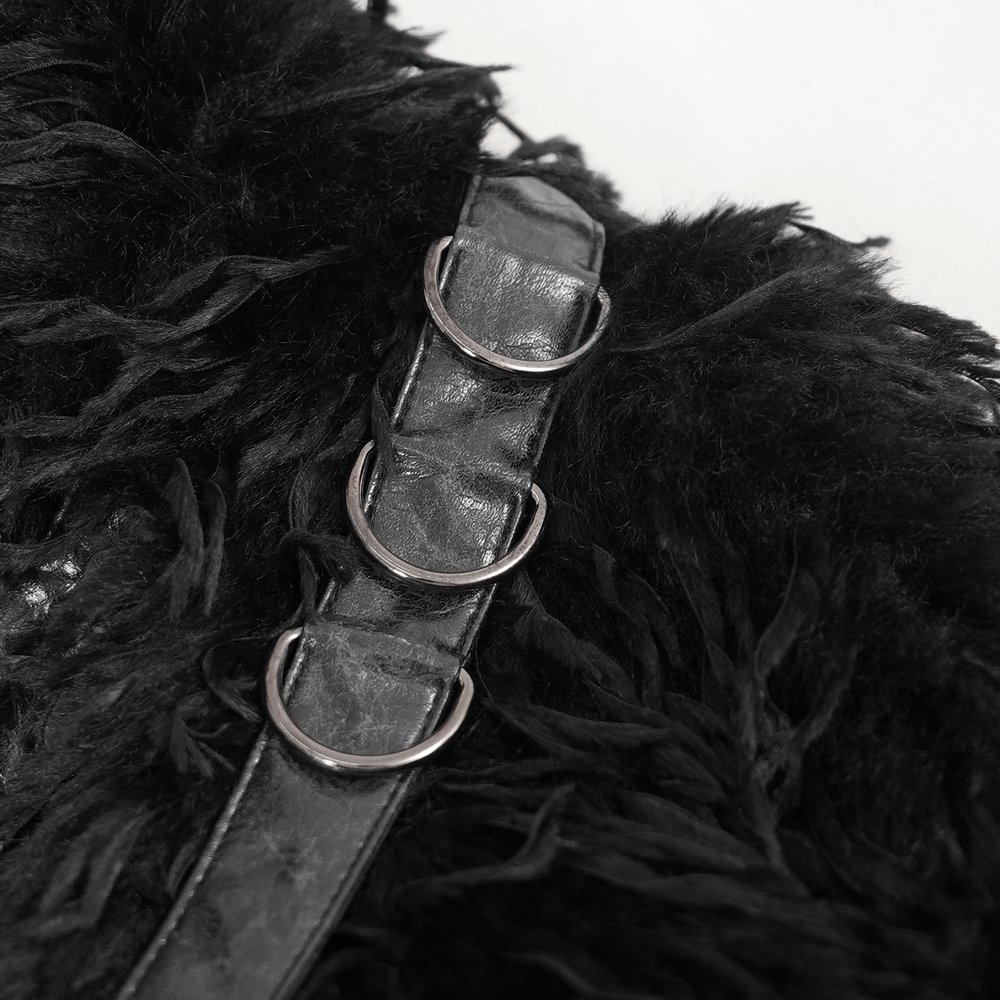 Close-up of the adjustable lacing and metal rings on the shaggy black faux fur cape, showcasing its gothic details.