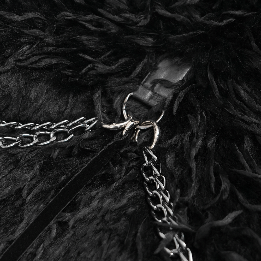 Close-up of the shaggy black faux fur cape featuring metal chains and adjustable lacing for a gothic look.