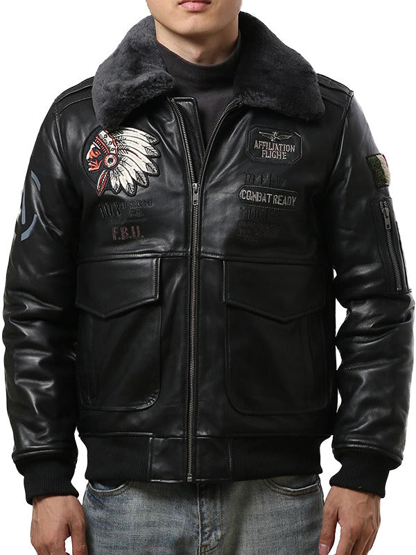 Men's vintage military-style black leather bomber jacket with fur collar and embroidered details.