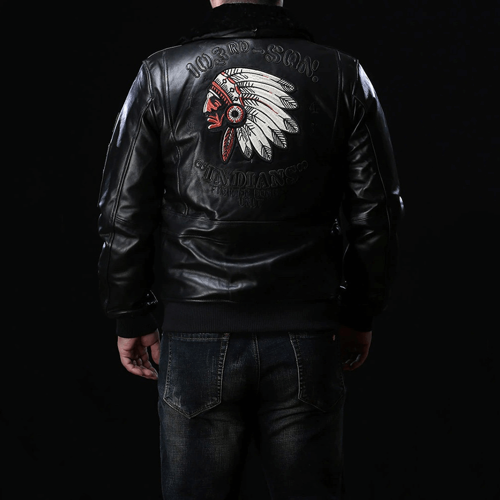 Men's black leather bomber jacket with fur collar and intricate embroidery on the back, showcasing a military-inspired design.