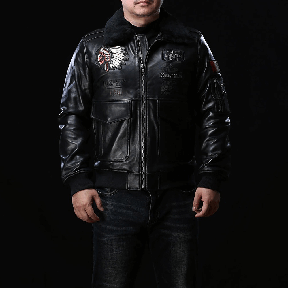Men's black leather bomber jacket with fur collar, military style, featuring vintage embroidery details.