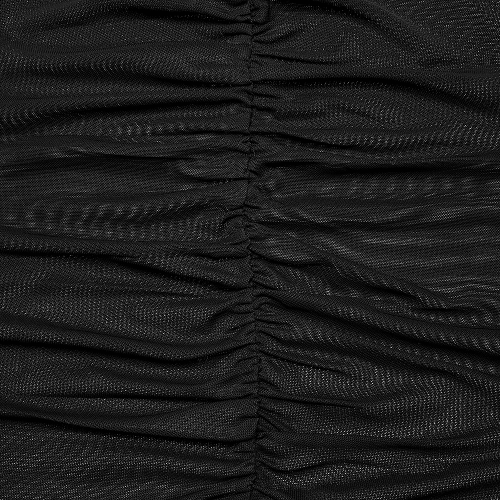 Close-up of sheer black mesh fabric highlighting pleated design details for a goth styled top.