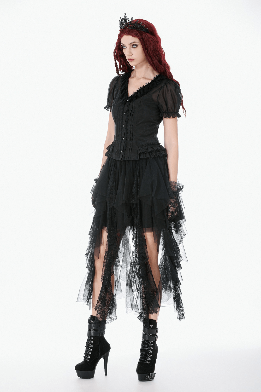 Sheer Gothic Blouse with Ruffled Hem and Lace Detailing modeled with dramatic layered skirt and stylish boots.