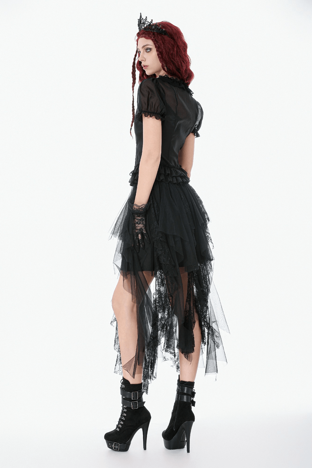 Sheer Gothic Blouse with Ruffled Hem and Lace Detailing worn with dramatic black skirt and heeled boots.