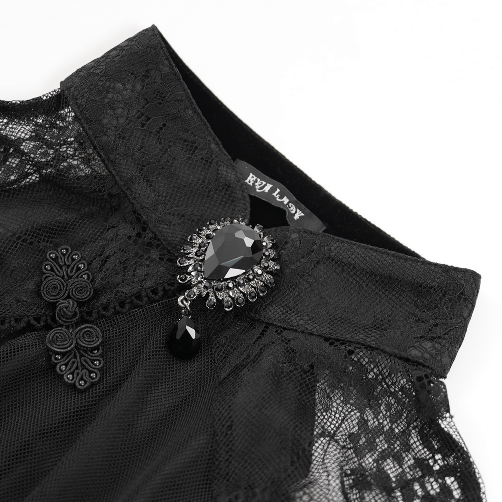 Close-up of the sheer lace dress collar with gemstone accent and intricate appliques, showcasing gothic elegance.