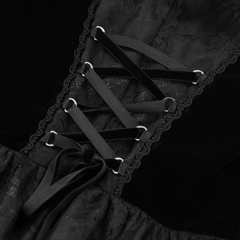 close-up of intricate black lace dress detailing with lace-up design and satin ribbons for a gothic elegance.