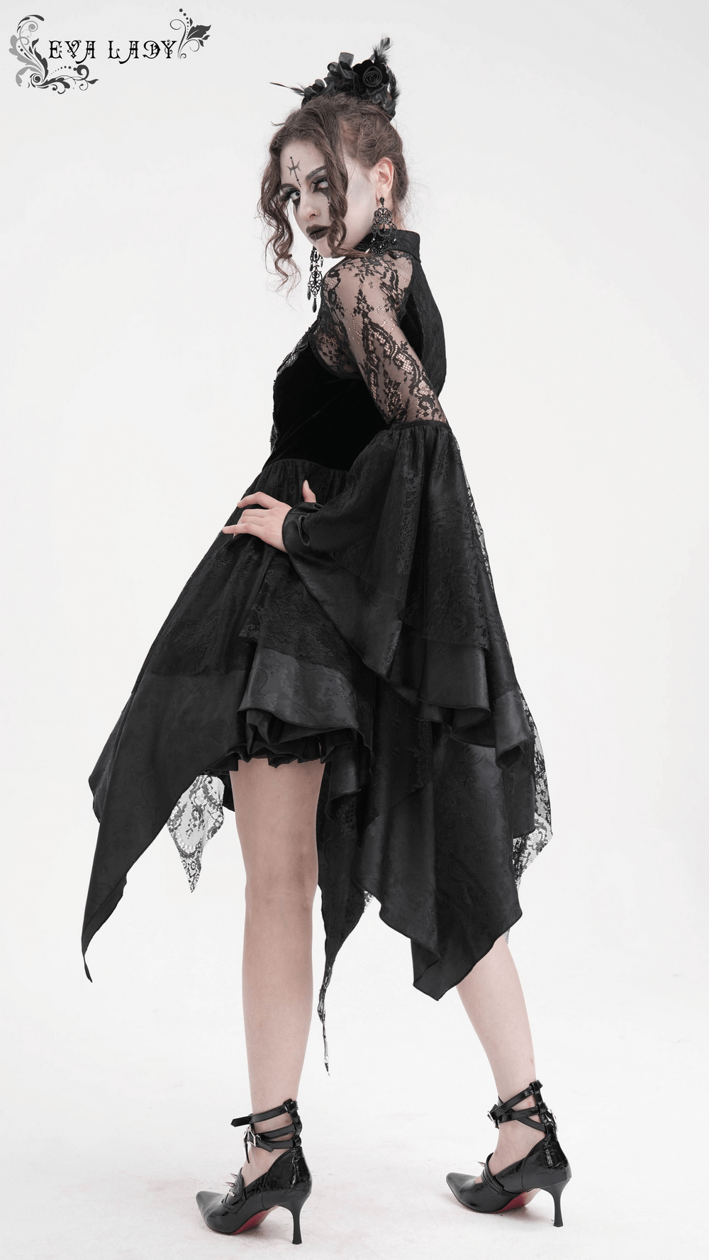 Elegant black sheer lace dress with flared sleeves and high-low hem, perfect for gothic events and dramatic fashion.