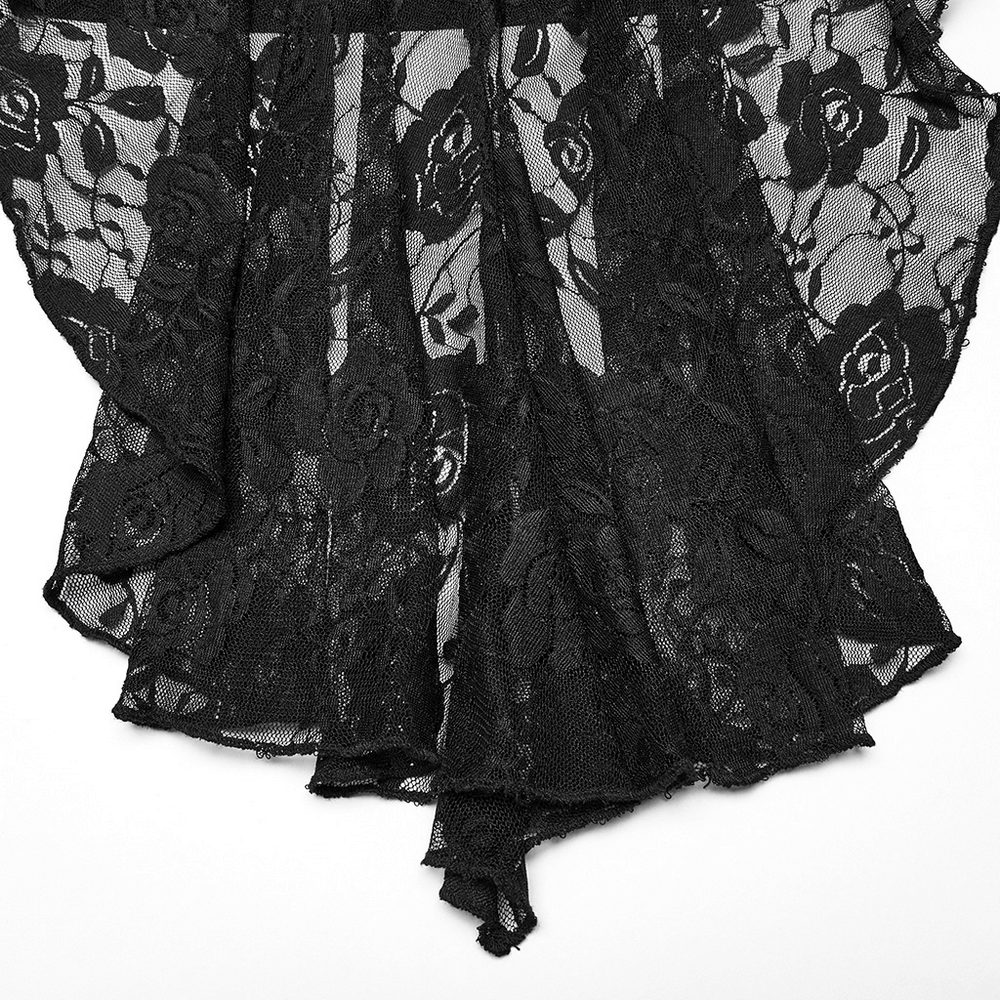 Close-up of sheer black lace fabric with rose patterns, showcasing gothic elegance and intricate details.
