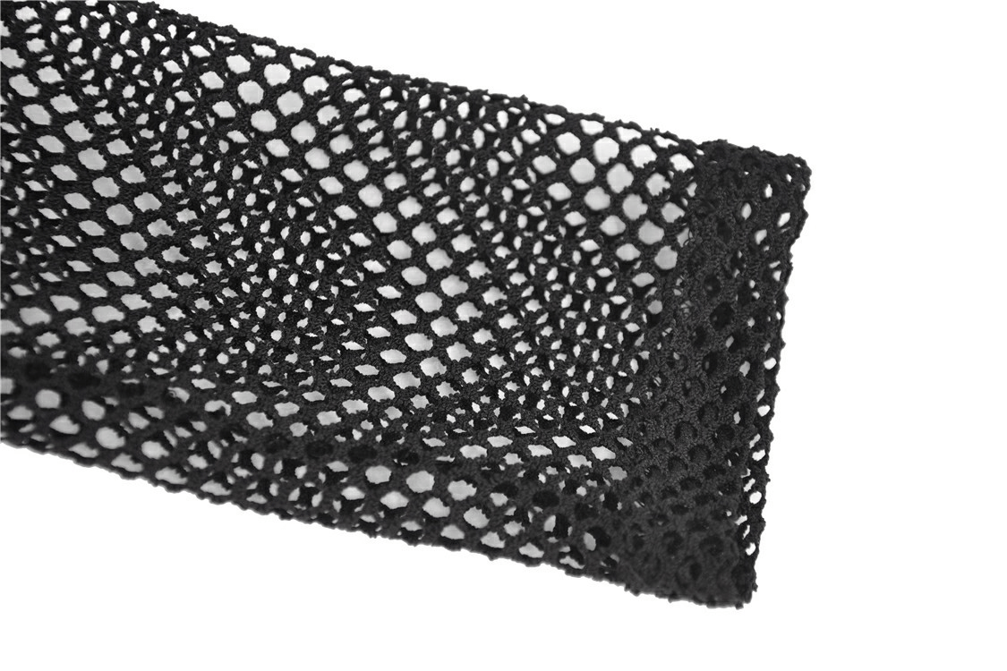 Close-up of black fishnet fabric showcasing its sheer mesh texture and intricate weave design.