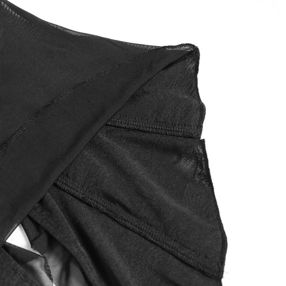 Close-up of Sheer Off-Shoulder Ruffled Mesh Top with Bell Sleeves showcasing ruffled black mesh detail.