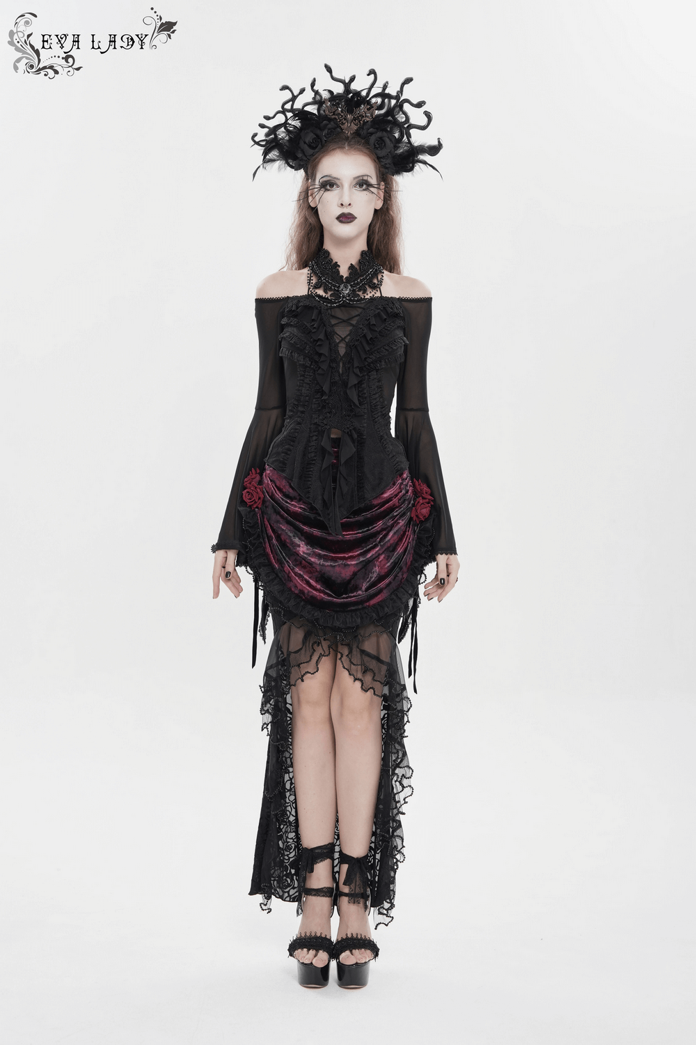 Sheer Off-Shoulder Ruffled Mesh Top with Bell Sleeves worn by a model featuring lace-up back and dramatic bell sleeves.