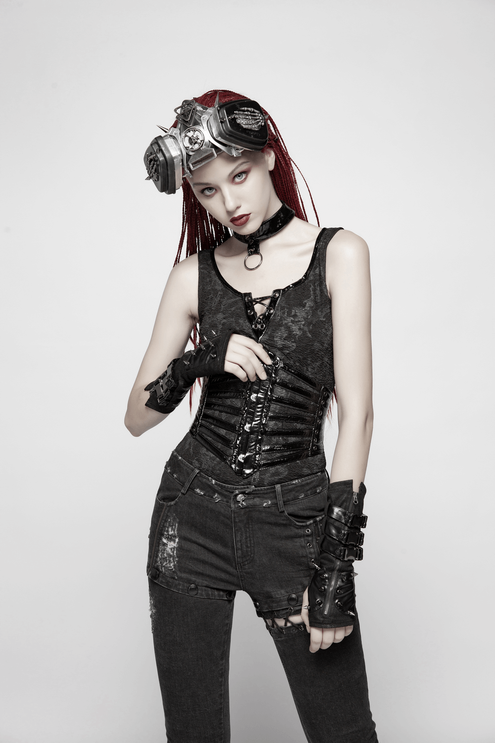 Model wearing a shiny patent PU punk corset belt with steel buckle, styled for a rebellious look.