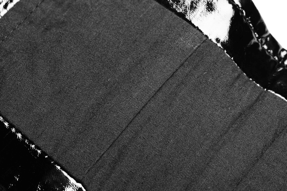 Close-up of sleek black patent PU corset belt showcasing detailed seam design for a punk-inspired look.