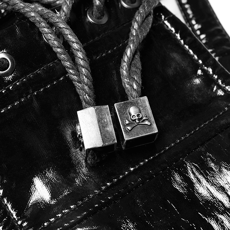 Close-up of shiny black PU punk corset belt detailing with steel skull embellishment and adjustable rope.