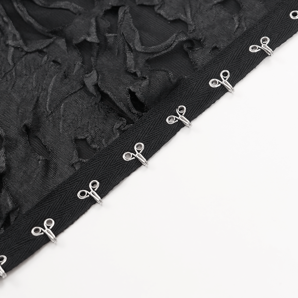 Close-up of shredded black fabric with silver lace-up detail for gothic hooded hoodie, showcasing edgy alternative fashion style.