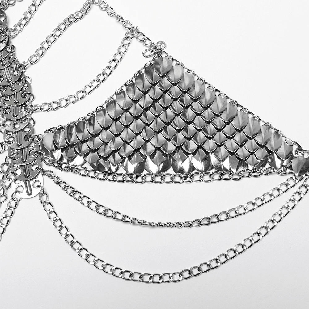 Silver dragon scale chain bra harness with layered metal accents and draping chains, perfect for edgy festival looks.