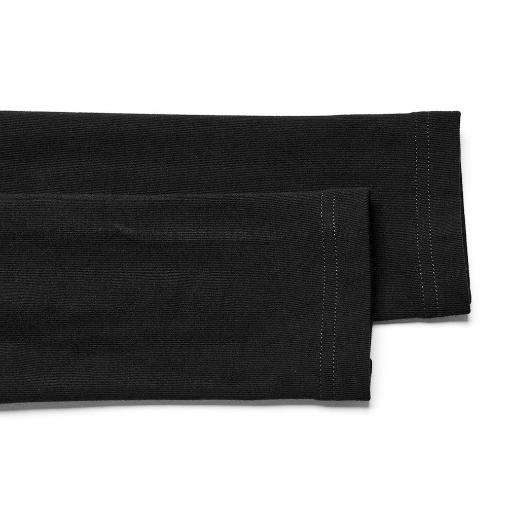 Close-up of black dress sleeves showcasing soft, stretchy fabric and neat stitching details.
