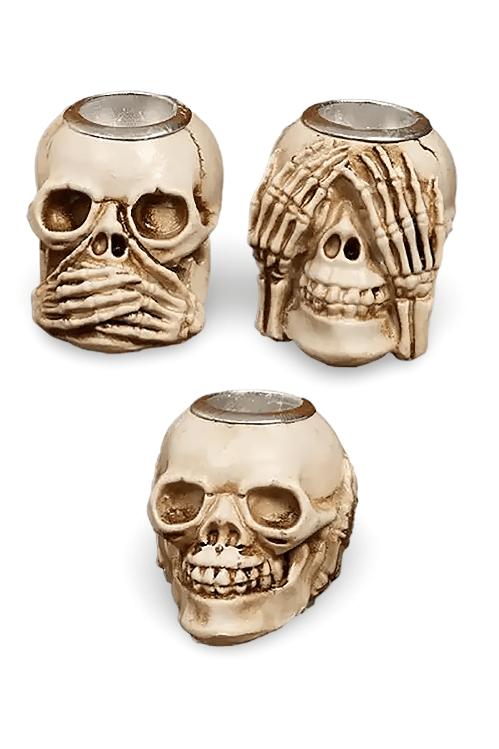 Unique skull candle holders set with skeleton hands design, perfect for Halloween and gothic decor.