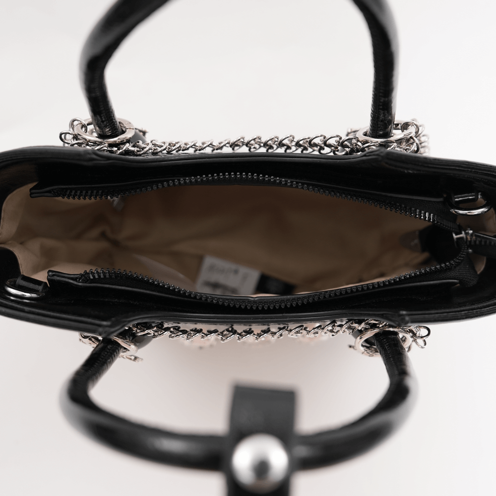 Inside view of the gothic chain-embellished tote bag featuring skull charms and a stylish chain strap.