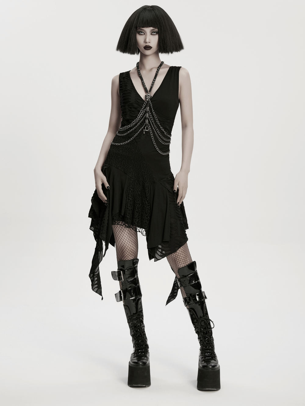 Skull Chain Harness Necklace with Layered Metal Design showcased on a model in a gothic outfit.