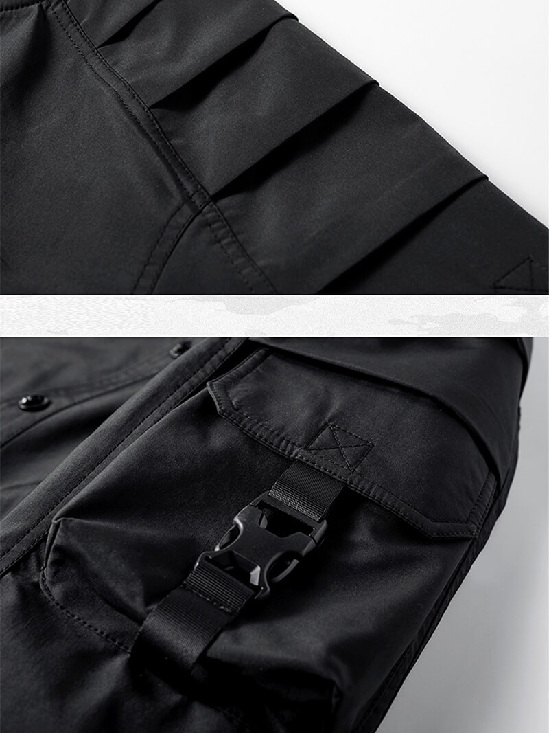 Close-up of the Skull Embroidery Bomber Jacket featuring sleek black fabric and rugged military-style pocket details.