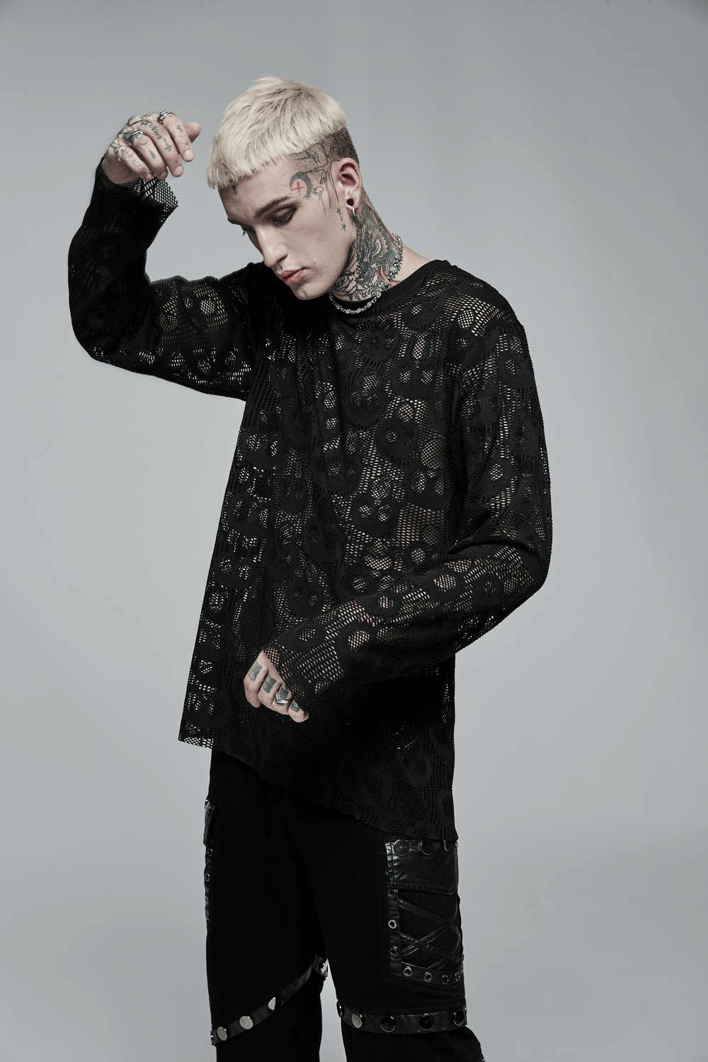 Men's punk skull mesh top with layered black design, showcasing edgy style and tattooed model for daily wear.